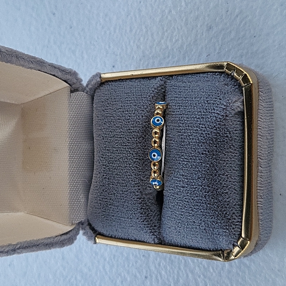 14 kt gold evil eye ring